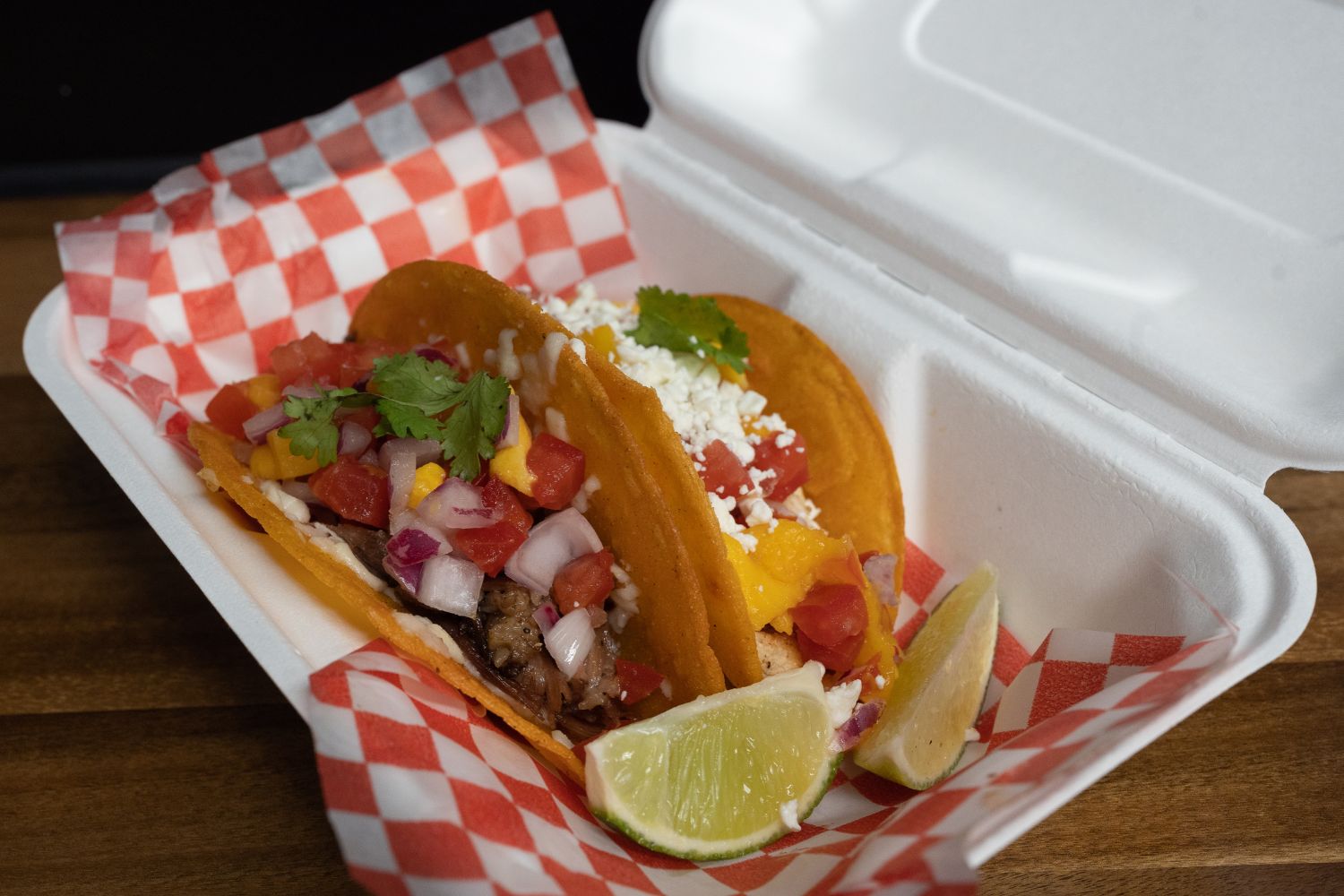 Alongside his fried chicken, Ngo serves up chicken and braised oxtail tacos, birria style, with goat cheese and bright mango pico de gallo. 