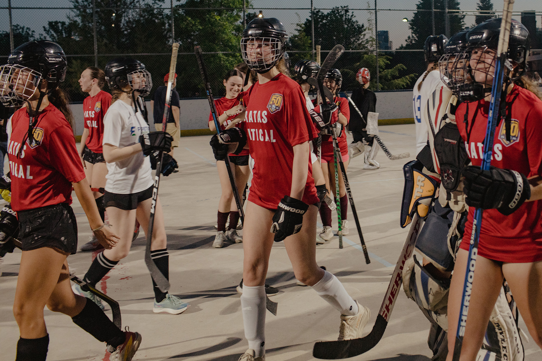 Withrow Park Ball Hockey League teams play at Riverdale Park East on a June evening. Photos by Chloe Ellingson / The Local
