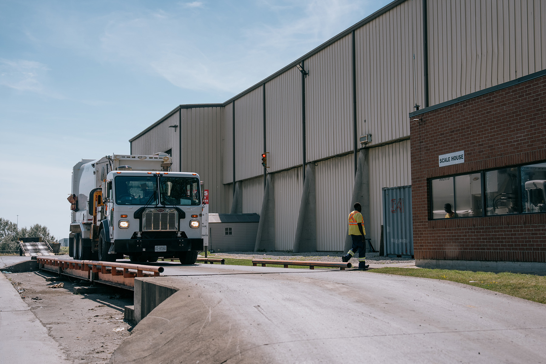 Left, inside the incinerator. Right, a load is delivered to the facility.