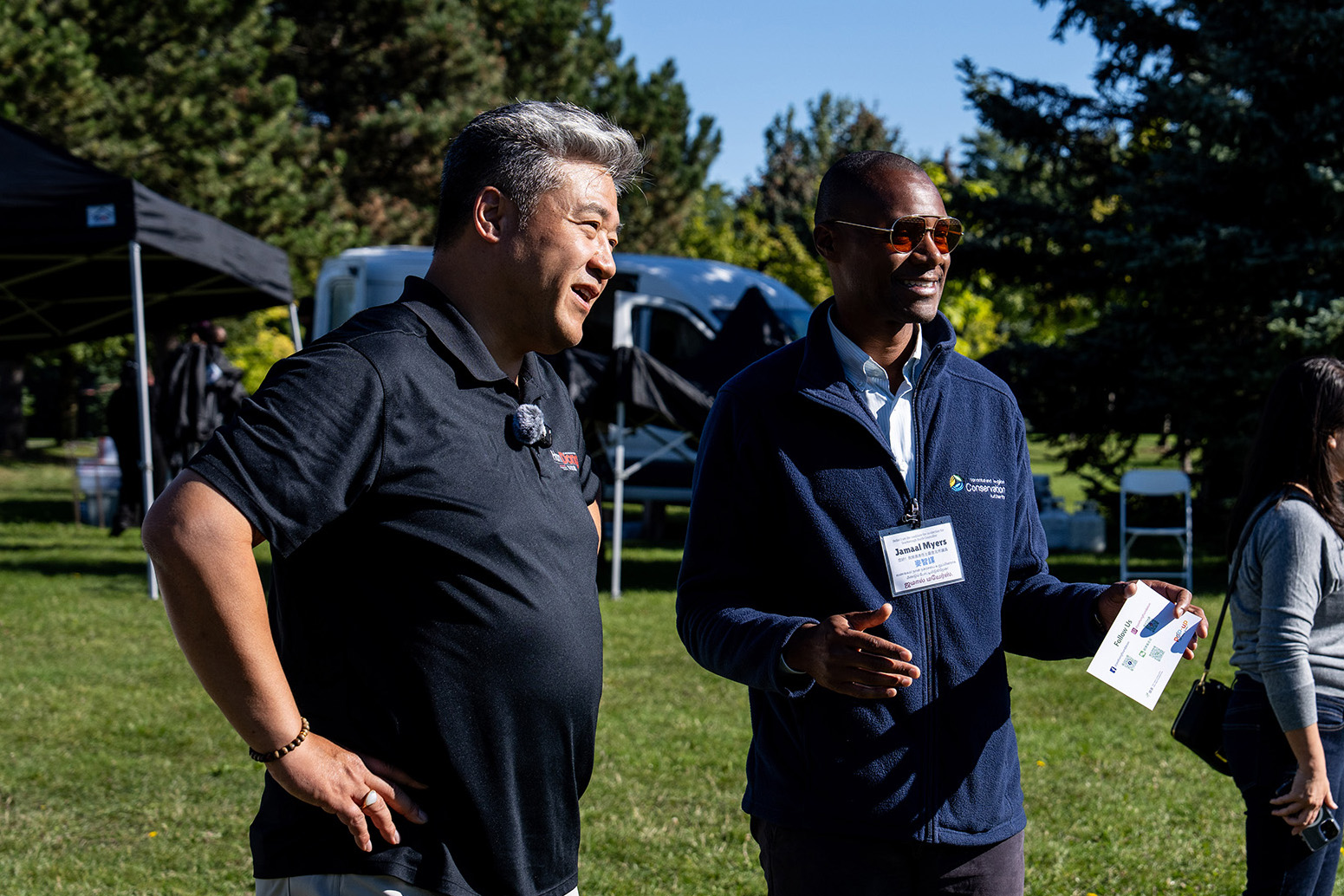 Councillor Jamaal Myers, right, speaks with candidate Han Dong at the Yee Hong Community Wellness Foundation Walkathon at Milliken District Park in September.