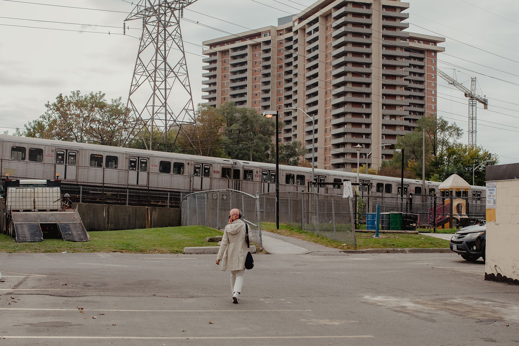 : A subway train passes the Cambridge Place Apartments in Scarborough Southwest in September.
