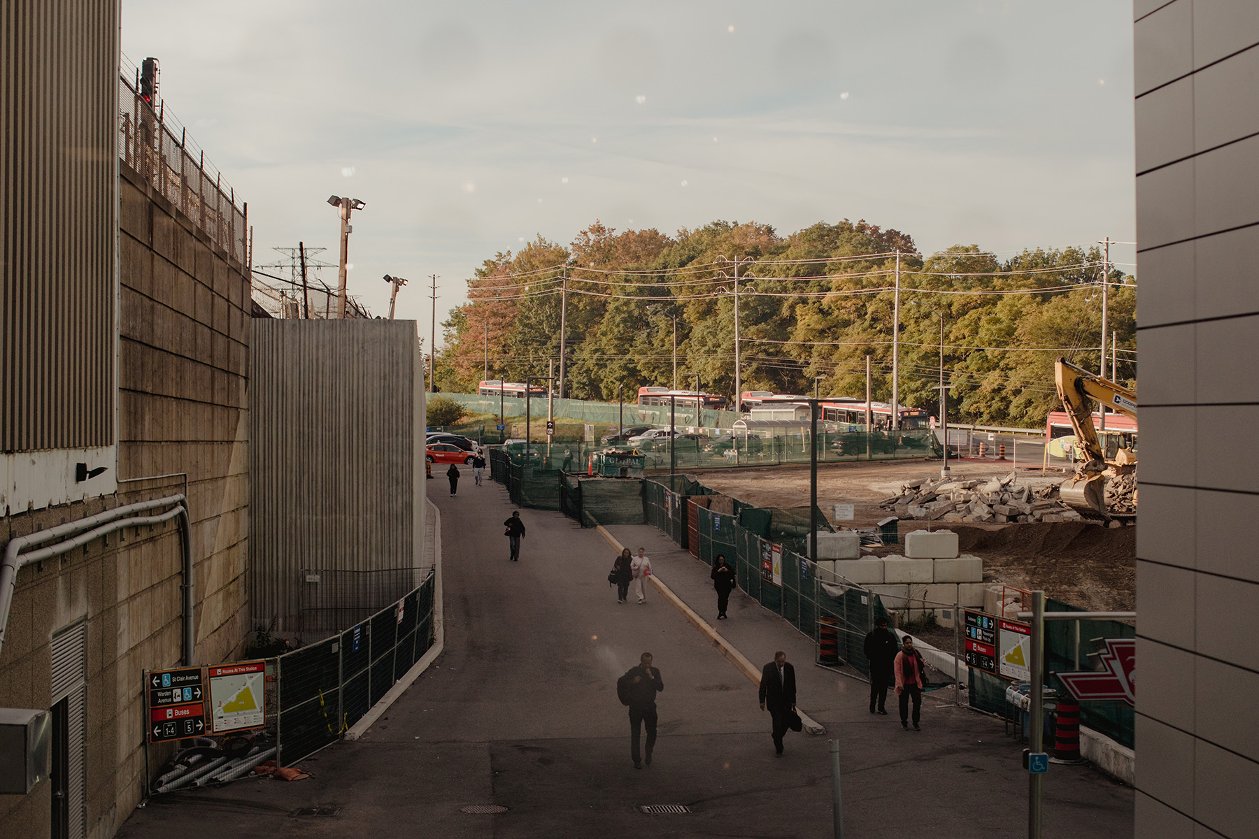 Transit riders navigate construction at Warden subway station in September.