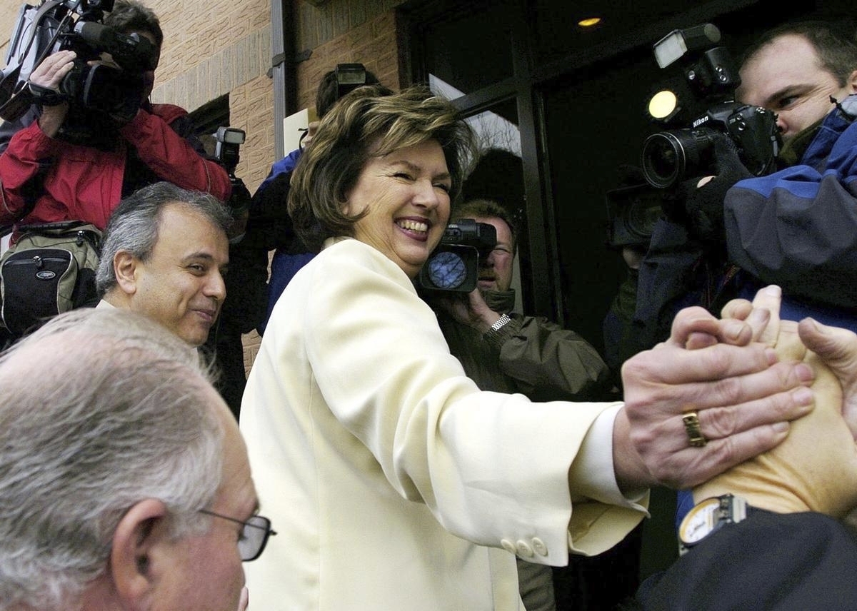 Mississauga Liberal MP Carolyn Parrish shakes hands with a supporter as she arrives at her office in Mississauga, Ont., Friday Nov. 19, 2004. Parrish was dumped from the Liberal caucus Thursday after denouncing the prime minister, the party and the U.S. administration. Photo by Aaron Harris/CP