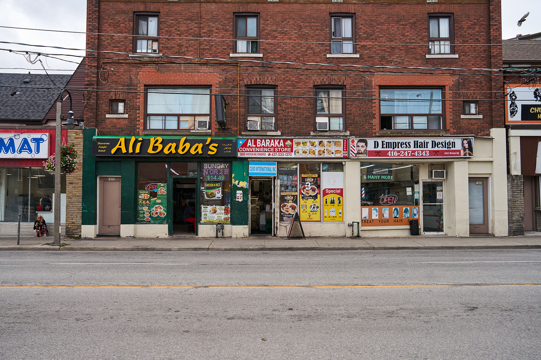 Left, a game of ball hockey on Beckett Avenue in September. Right, businesses on Weston Road near Lawrence Avenue West.