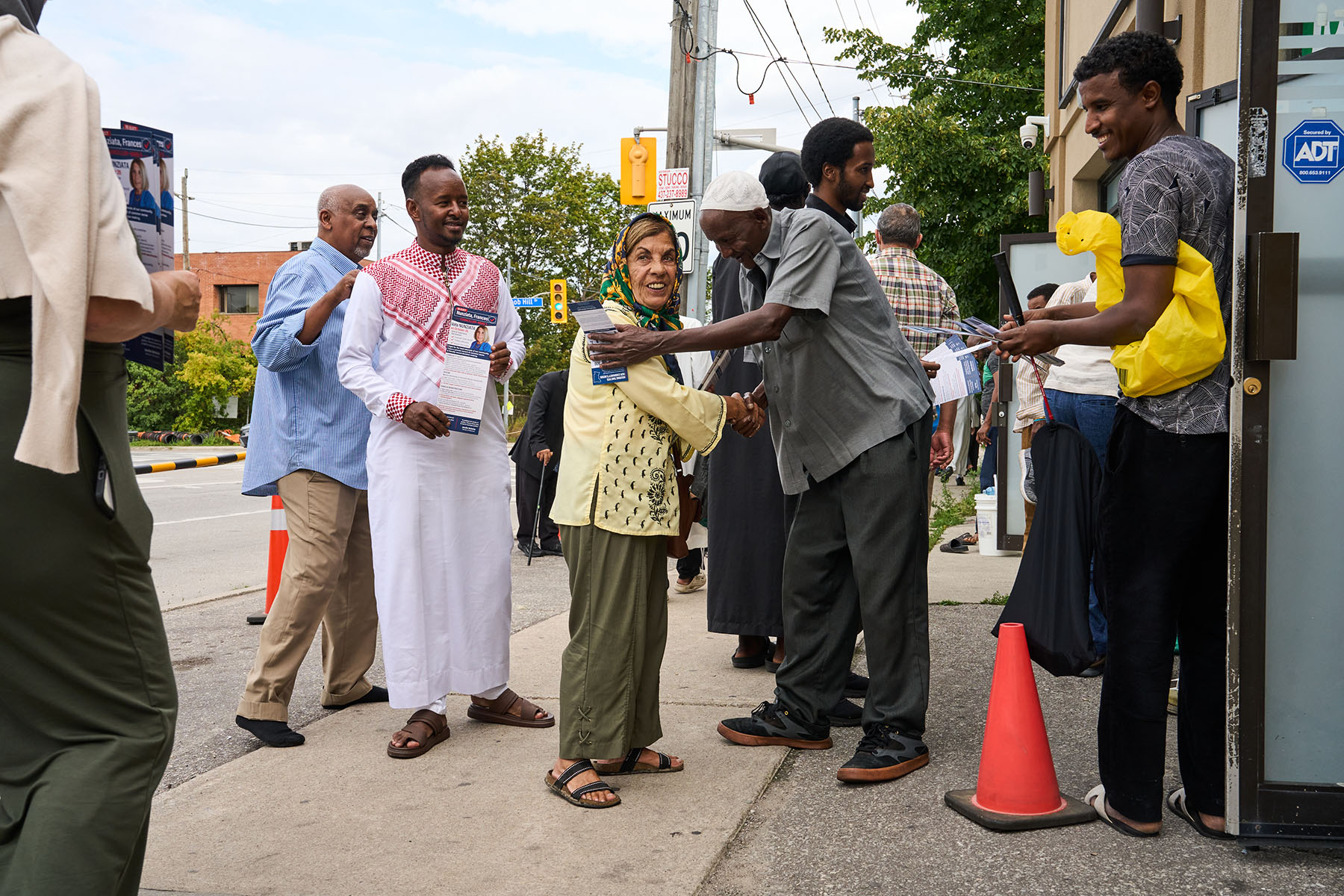 Mosque-goers greet Nunziata, who had planned to hand out campaign literature at the Towfiq Islamic Centre near Weston Road and Highway 401 in September.