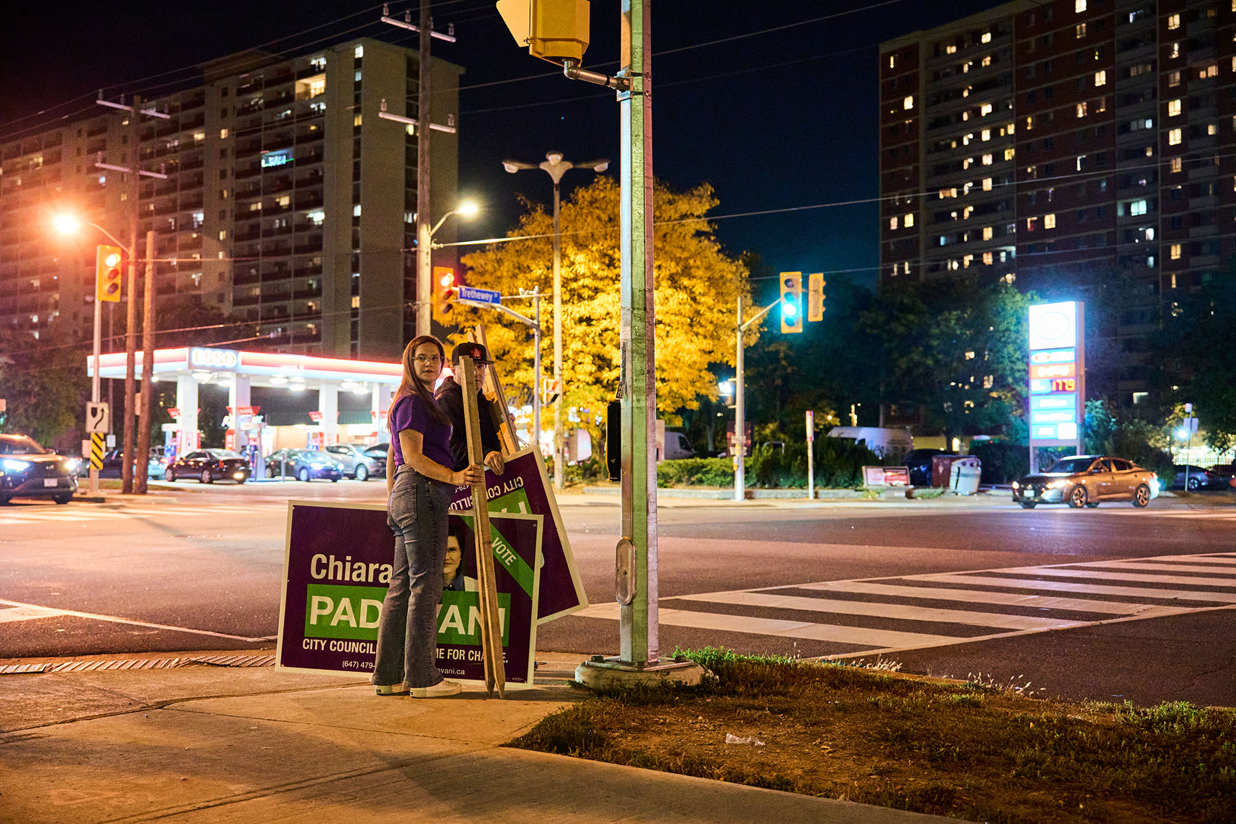 Padovani and volunteer Mark Reed wait for the rest of their team to catch up on Trethewey Drive.
